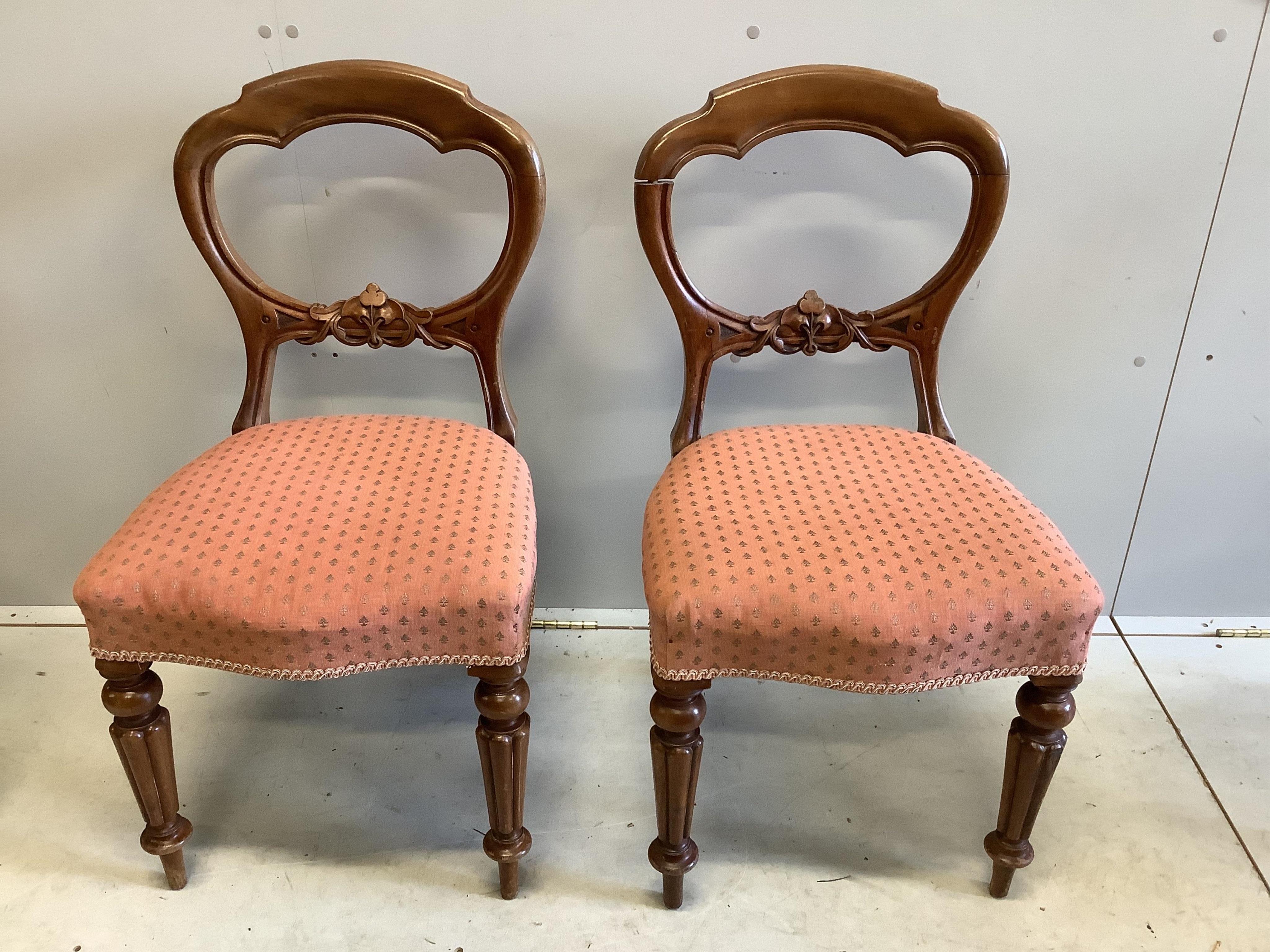 A pair of Victorian mahogany dining chairs, on fluted legs, another on cabriole legs and a Chippendale style chair, with a drop in tapestry seat. Condition - fair